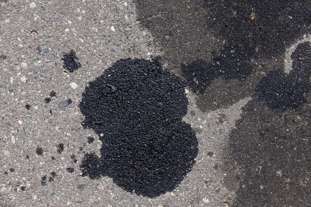 How to remove shop oil from driveway