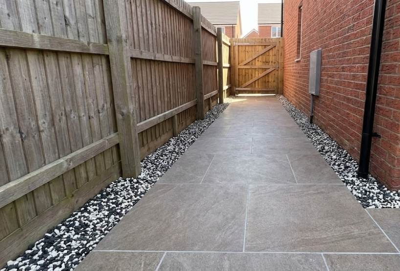 Commercial porcelain pathway installation designed for high-traffic business environments