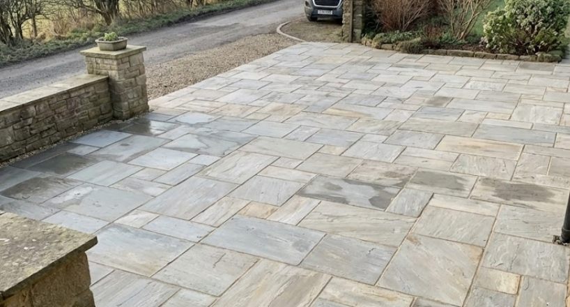 How Much Does an Indian Sandstone Driveway Cost in Meltham?