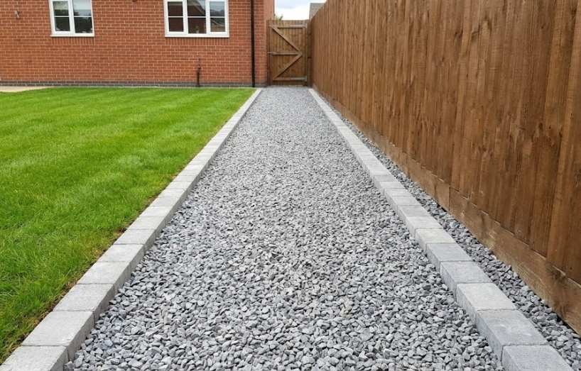 How Permeable Gravel Pathways Manage Surface Water and Prevent Drainage Problems Common to Solid Paving