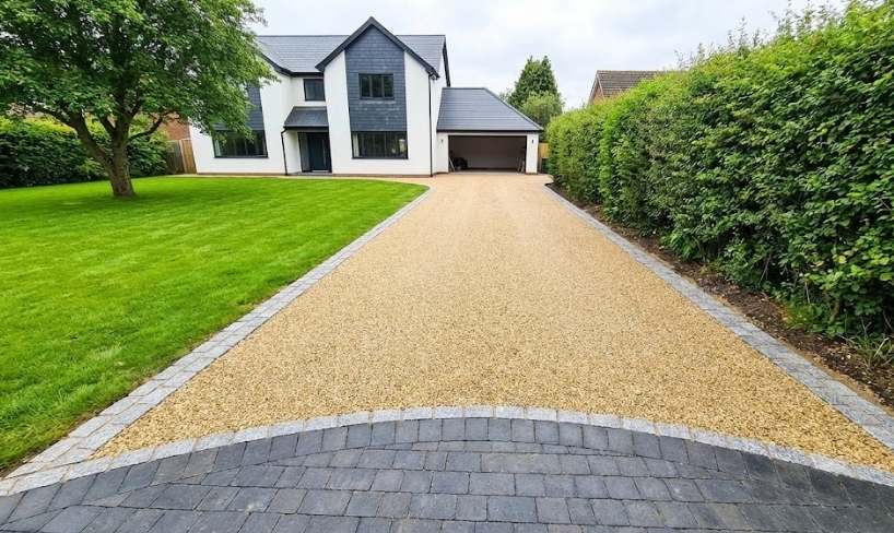 Professional edging and border options that give your driveway clean defined boundaries