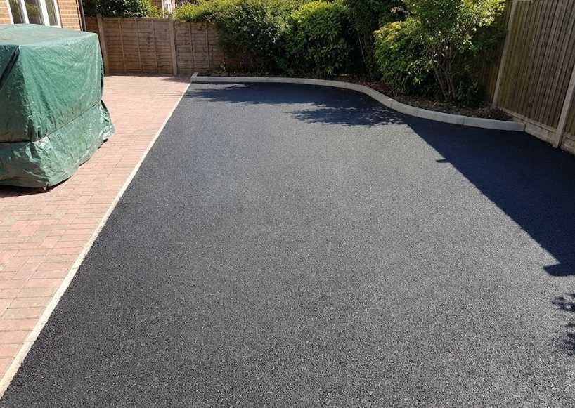 Design options with coloured tarmac and block paving edge treatments