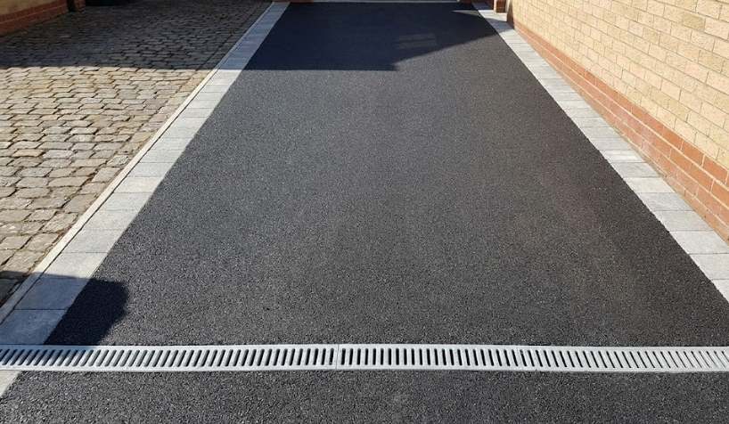 Effective drainage integration to prevent standing water and surface damage